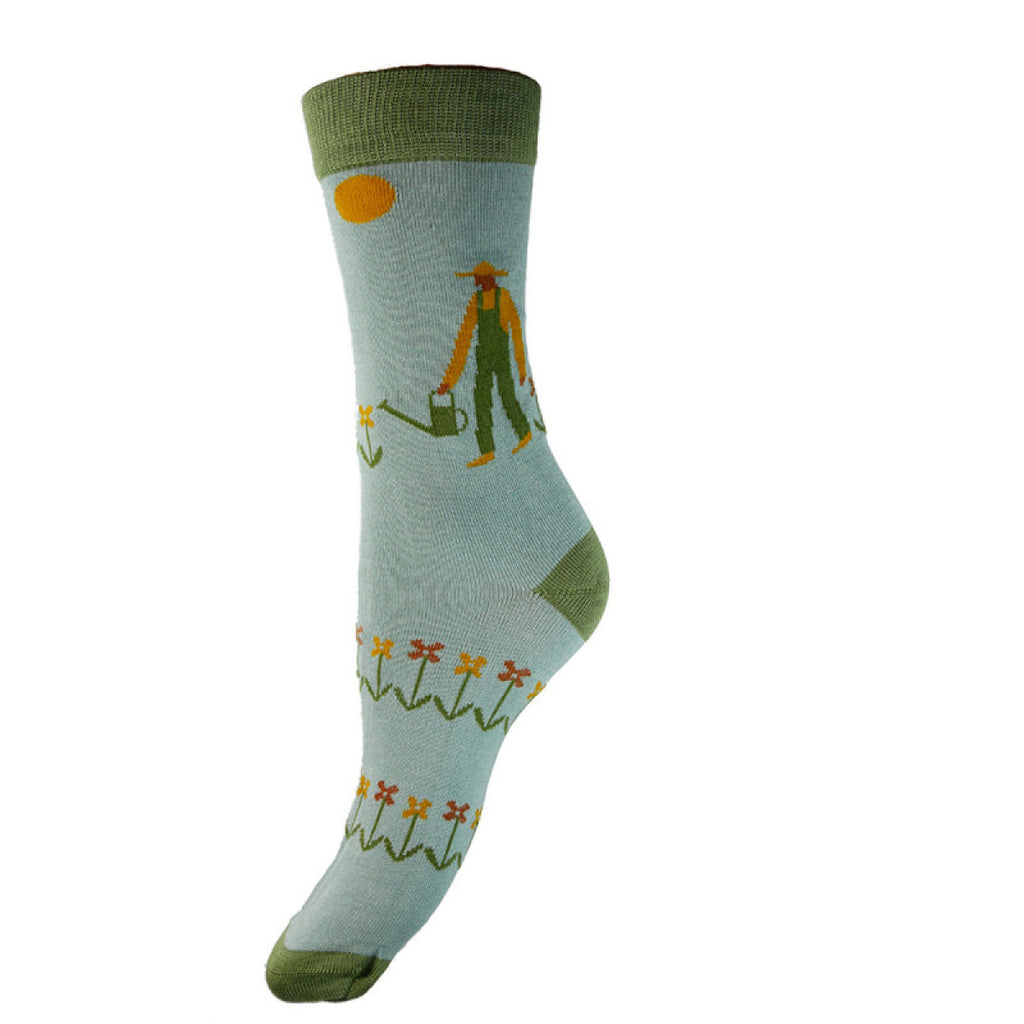 Pale blue bamboo sock with gardening images, green toe, heel and cuff, size 4-7 UK