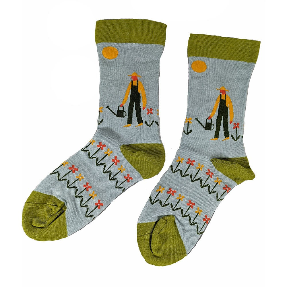 Pale blue bamboo socks with green heel toe and cuff, gardener motif, size 4-7